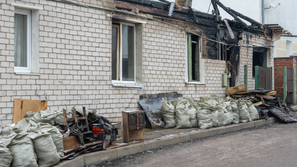 Professional Emergency Fire Cleanup technician working in Amery, WI